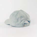 Frottee Cap - Fresh Mint mit Regenbogen-Tag am verstellbaren Riemen, Rückansicht, fotografiert vor weißem Hintergrund.