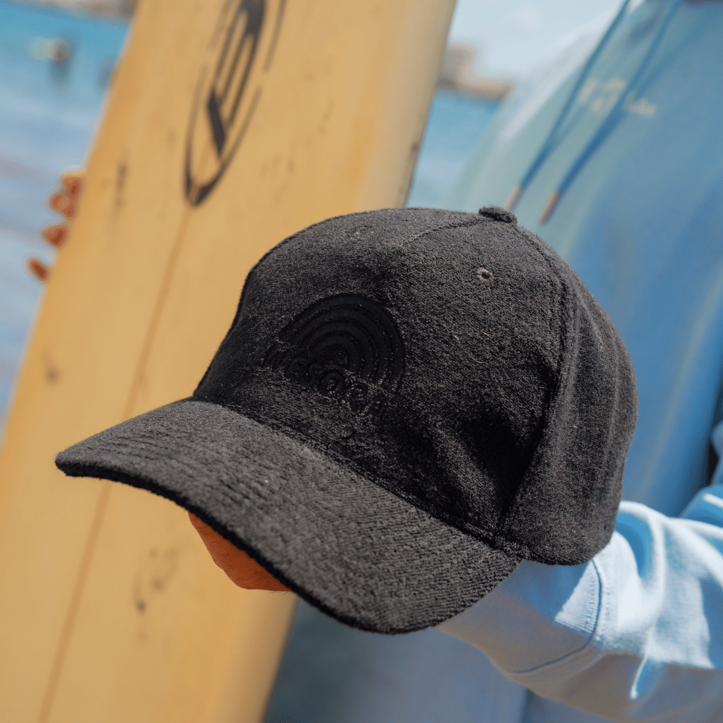 Terry Cotton Cap in der Farbe schwarz als bequemer und zuverlässiges Asseccoir im Sommer