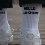 Tennissocken aus Baumwolle in der Farbe weiss mit positivem Slogan und verstärkter Ferse