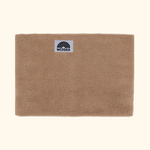 WESORA The Teddy Neckwarmer in sanftem beige gefertigt aus doppellagigem Polar Fleece liegend