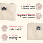 Fluffy Zip Bag - White, cremefarbene flauschige Tasche mit Regenbogenlogo, handgefertigt in Deutschland aus recycelten Stoffresten, mit Reißverschluss, eine stilvolle, nachhaltige Begleiterin.